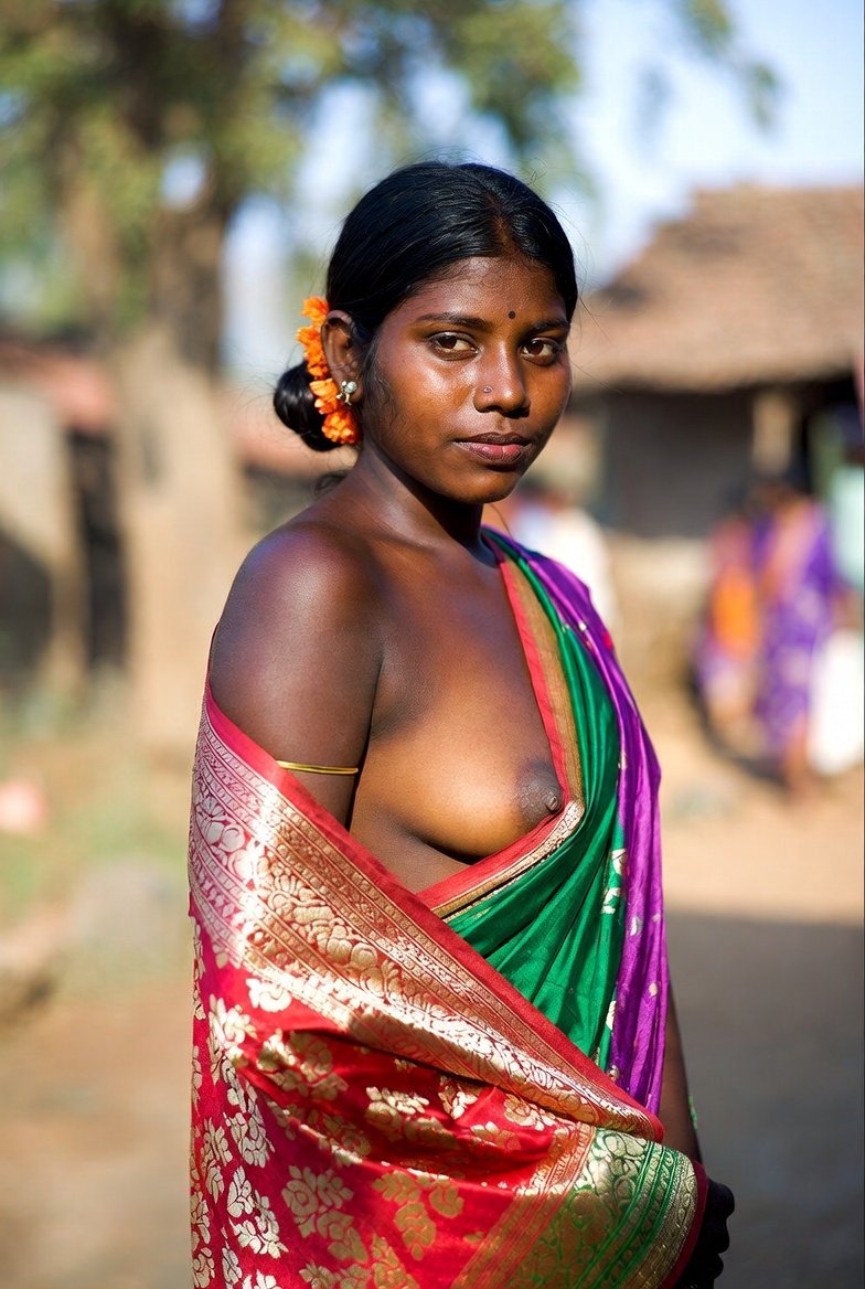 Captivating Indian woman in colorful saree outdoors