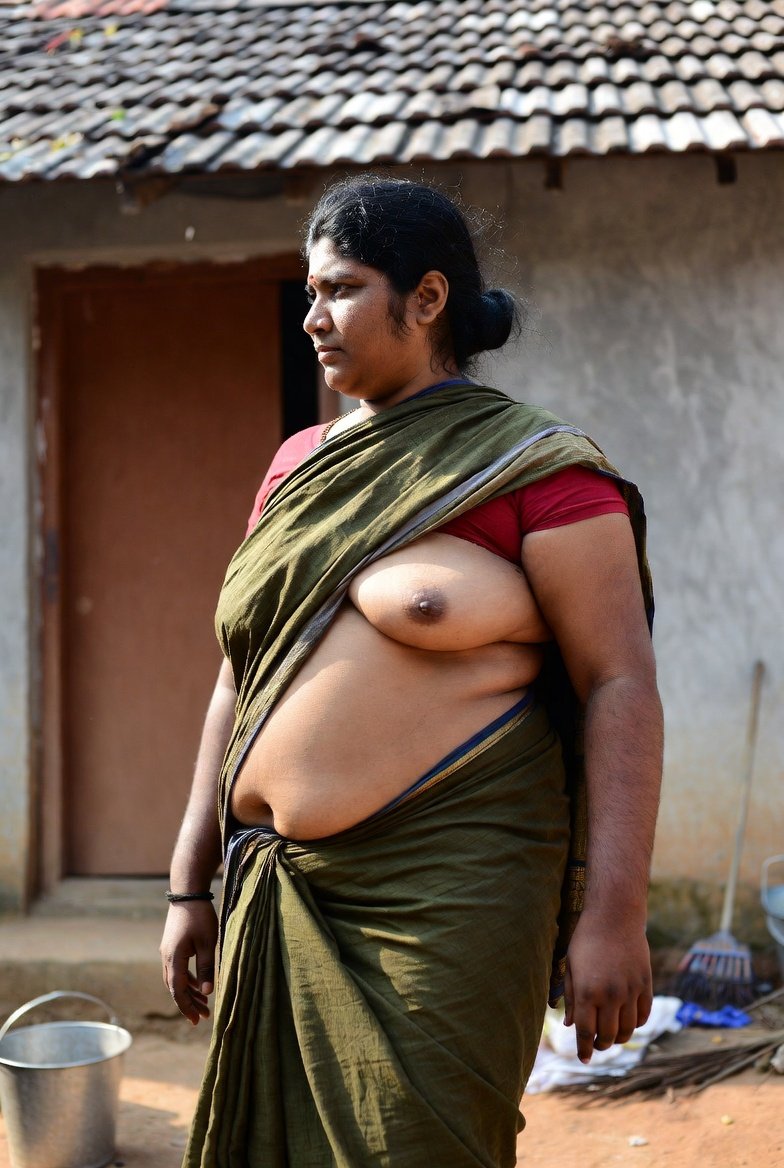 Voluptuous Indian bhabhi in green sari outdoors