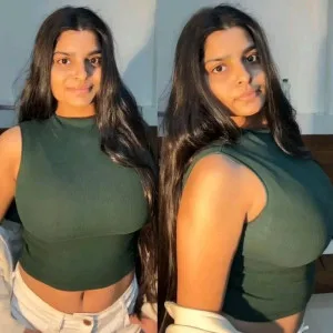 Indian bhabhi in tight forest green crop top showing curves