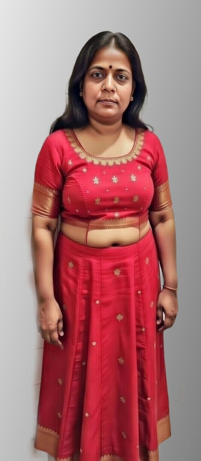 Captivating Indian bhabhi in red lehenga standing confidently