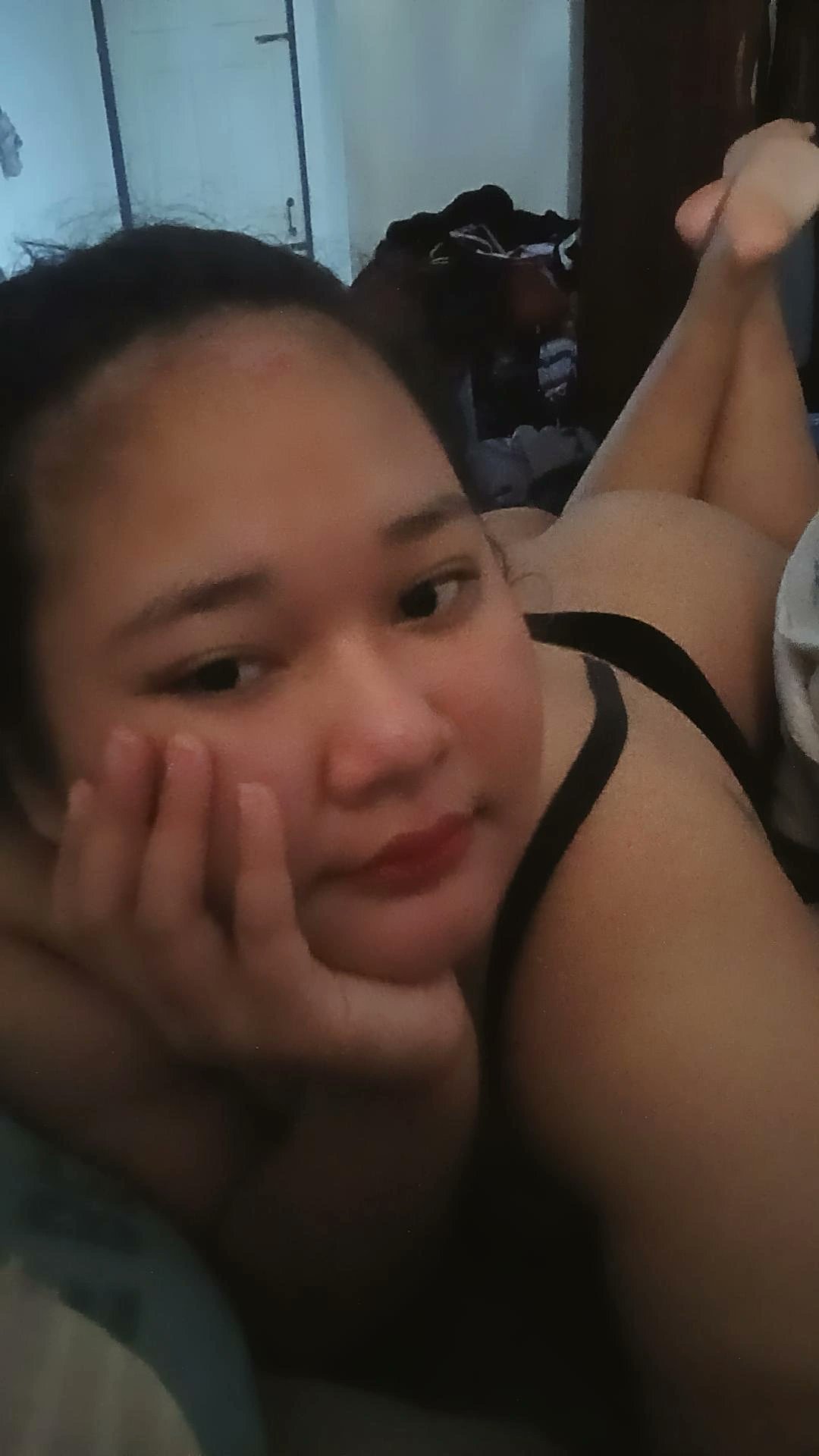 Punjabi girl in bra playfully posing in bedroom